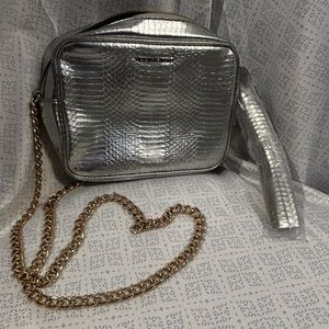 NWOT Victoria Secret silver purse w/gold chain strap.